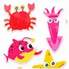 Marine-themed reusable silicone sticker samples with crab, squid and fish designs