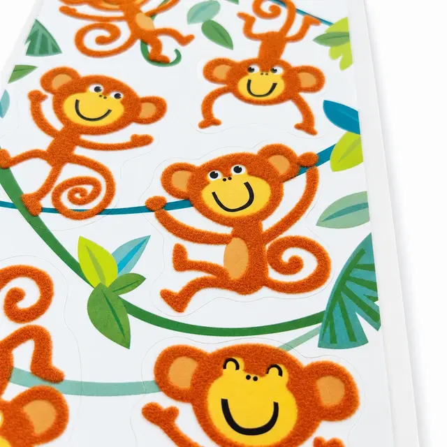 Orange monkey flocking sticker sheet with soft textured surface
