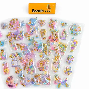 Transparent pastel acrylic-style sticker samples with holographic star inclusions